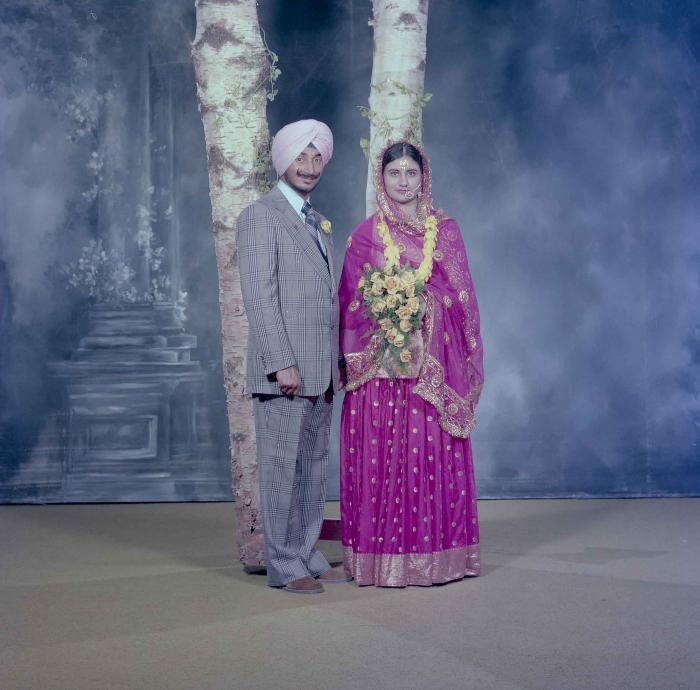 [Photo of Joginder Thind and Parminder Grewal]
