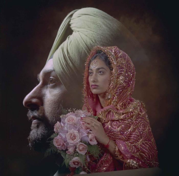 [Photo of Onkar Brar and Malkit Gill]