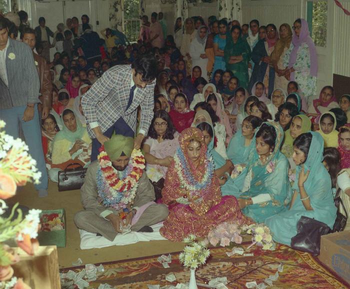 [Photo of Onkar Brar and Malkit Gill]