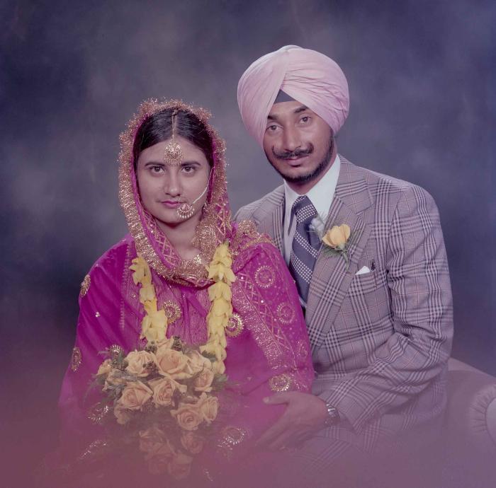 [Photo of Joginder Thind and Parminder Grewal]