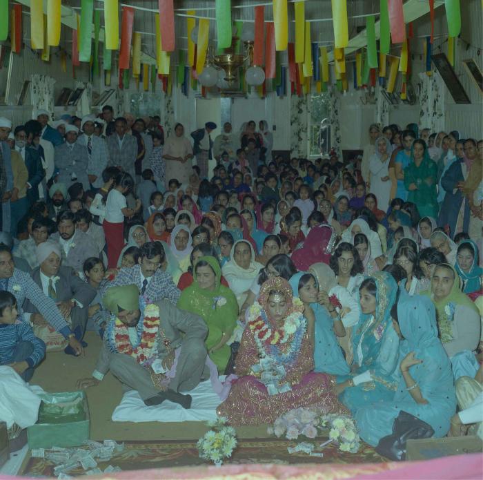 [Photo of Onkar Brar and Malkit Gill]