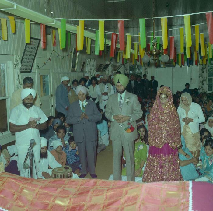 [Photo of Onkar Brar and Malkit Gill]