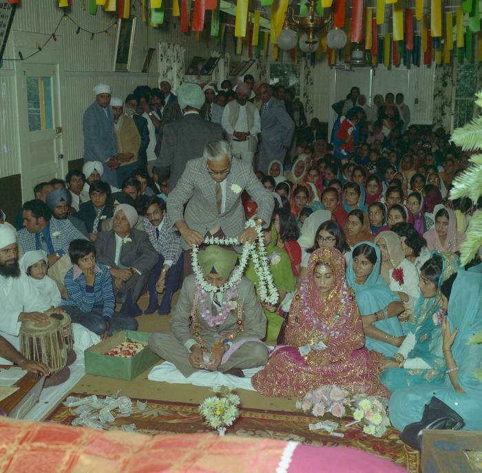 [Photo of Onkar Brar and Malkit Gill]