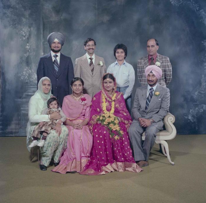 [Photo of Parminder Grewal and Joginder Thind]