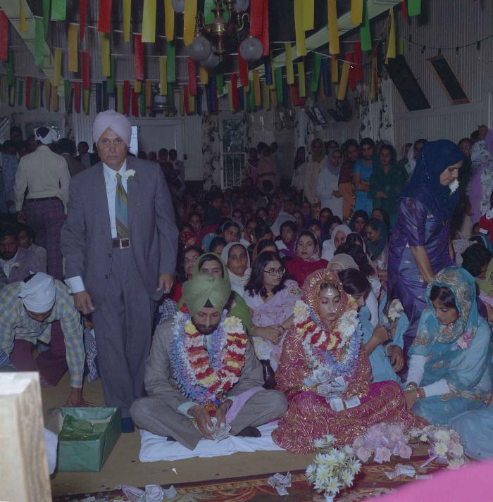 [Photo of Onkar Brar and Malkit Gill]